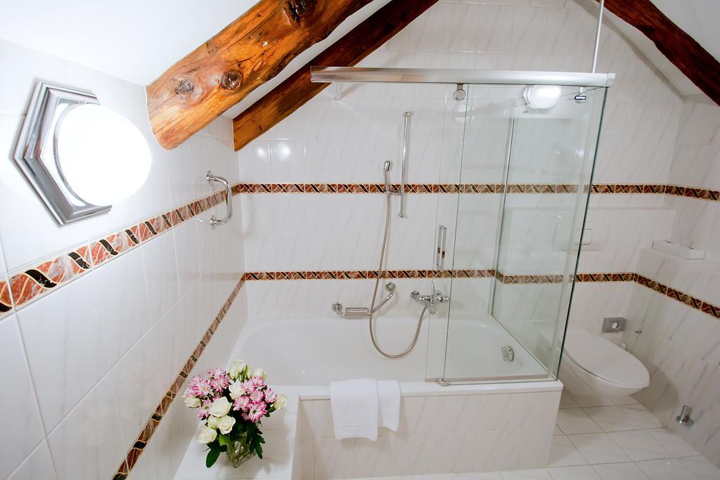 Romantik Hotel Castello Seeschloss Ασκόνα Δωμάτιο φωτογραφία